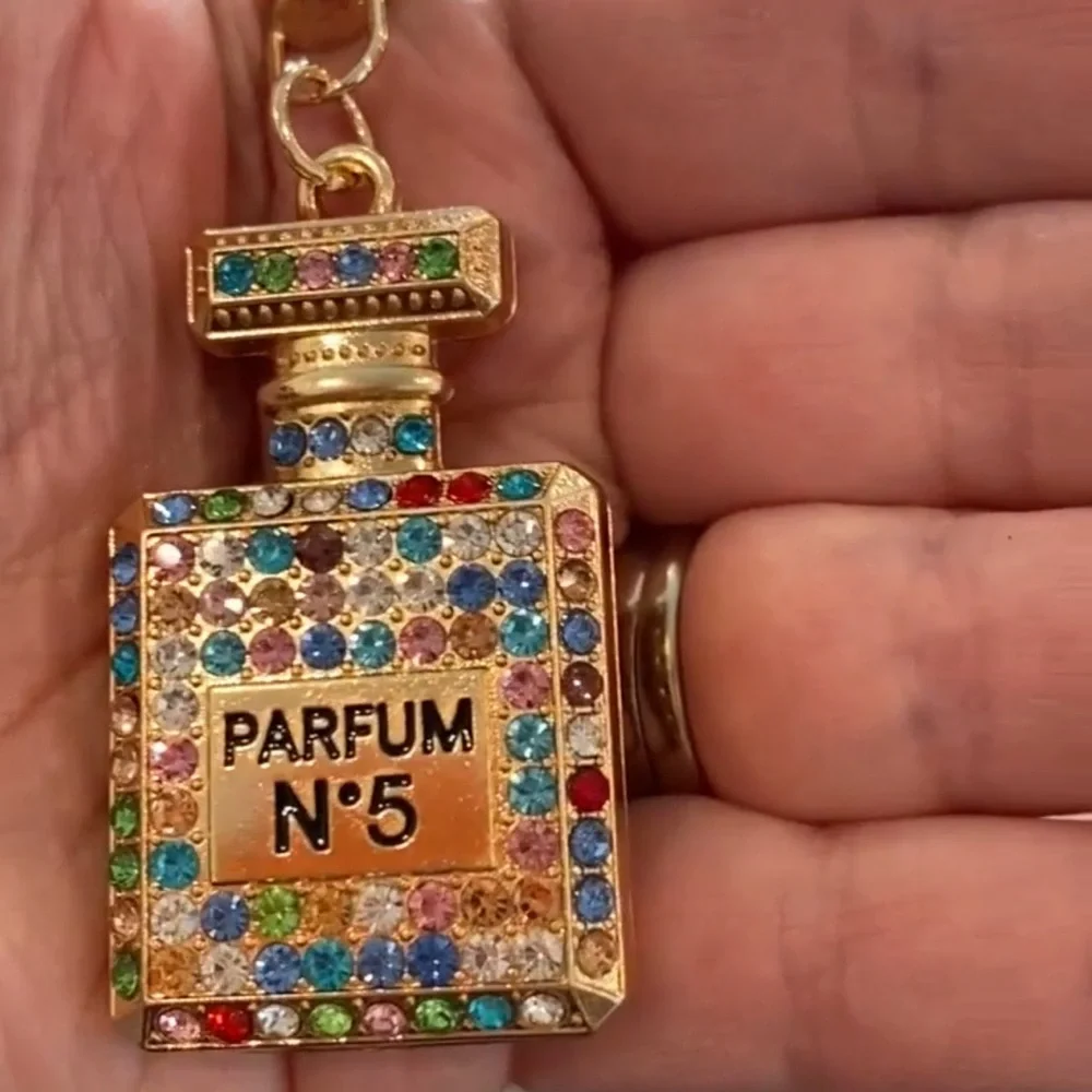 Elegant Rainbow crystal adorned Parfum bottle Goldtone keychain - Picture 3 of 7
